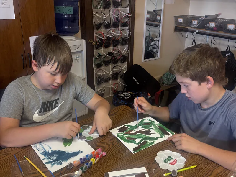 Students working on an art project together